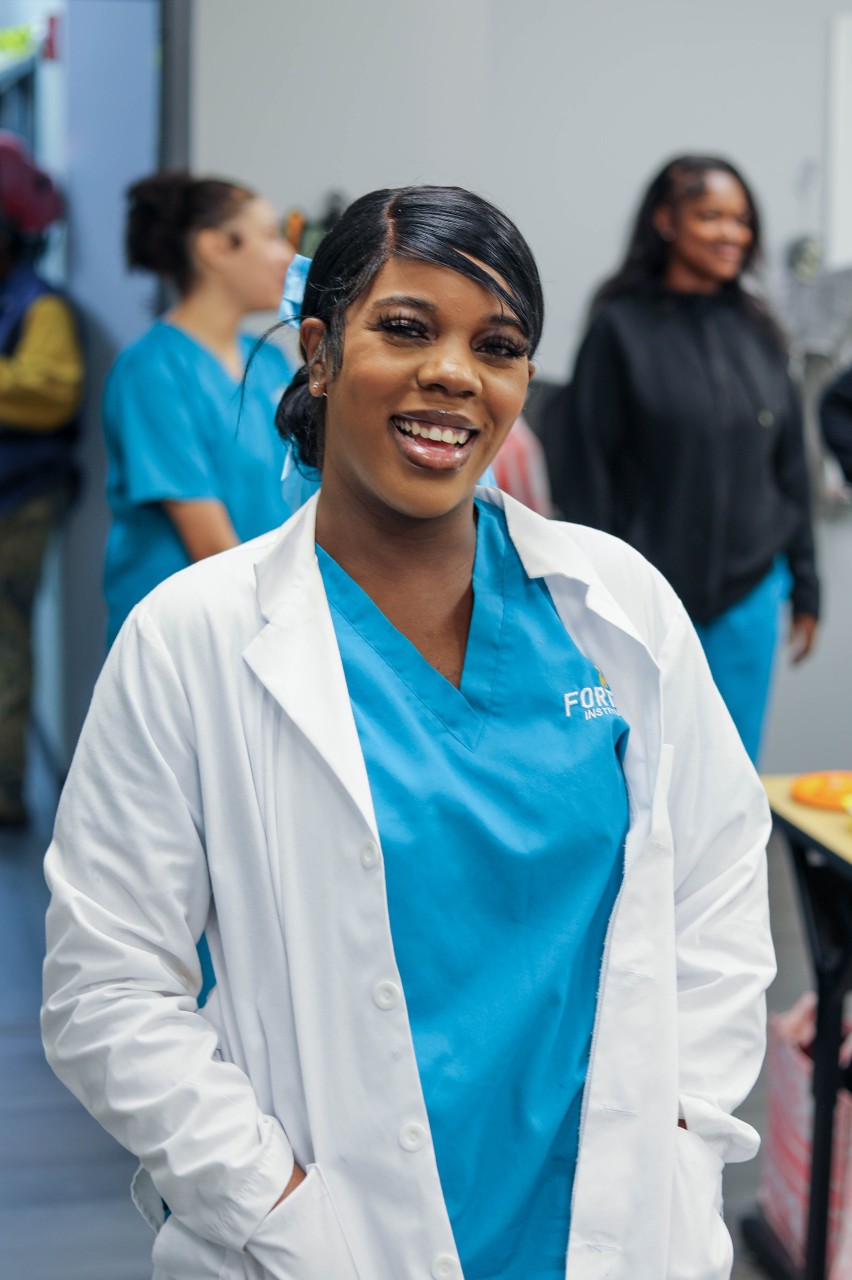 Young female nurse with elderly female